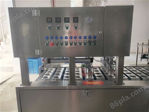 武汉吕工牌4口杯装巴氏鲜奶自动灌装封口机